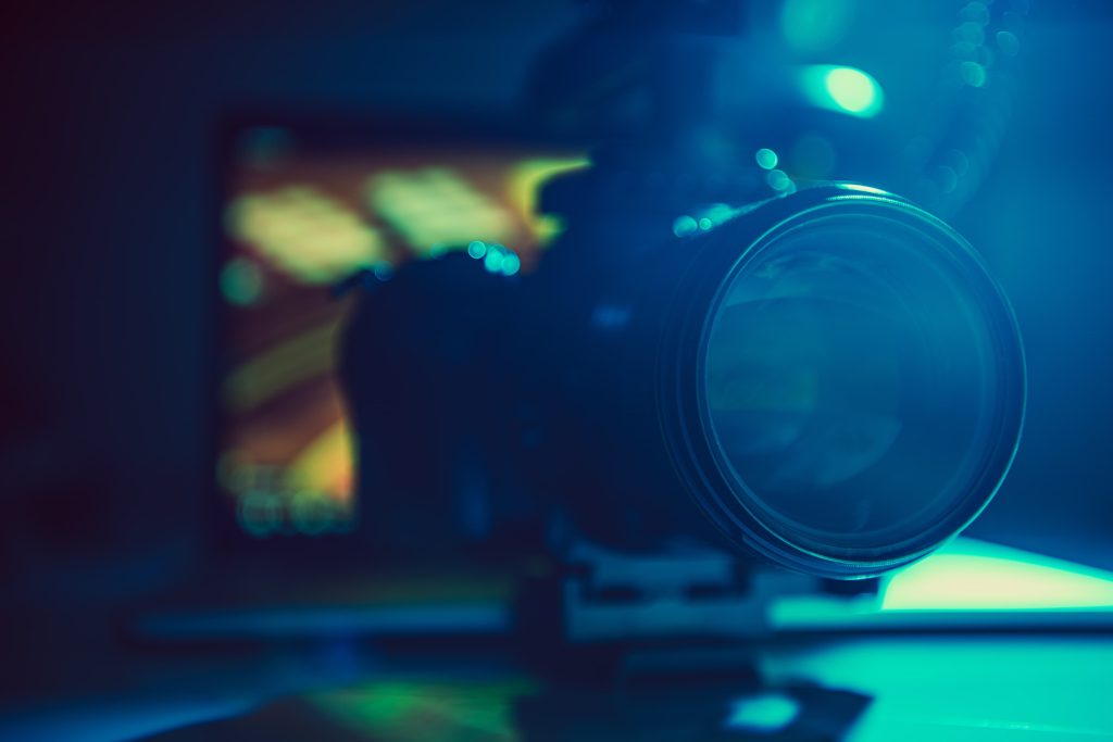 A creative team from an exceptional Houston Video Production Agency editing high-energy short-form video content for social media.