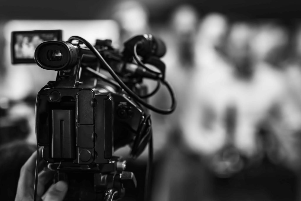 A professional Lafayette Video Production Company crew from Tone Production filming a high-impact corporate documentary at a local innovation hub