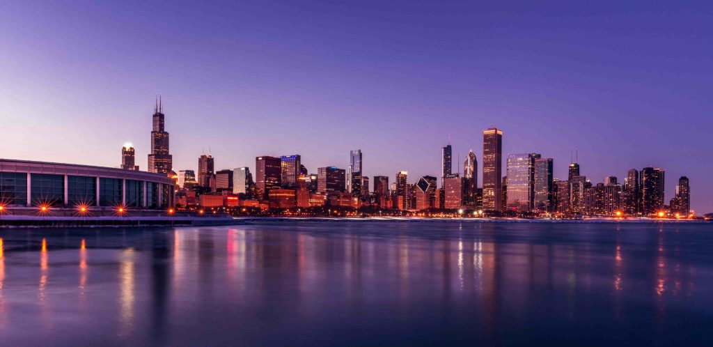 A professional film crew from Tone Production, a top Chicago Video Production Company, capturing high-end cinematic footage in the heart of the Chicago Loop.