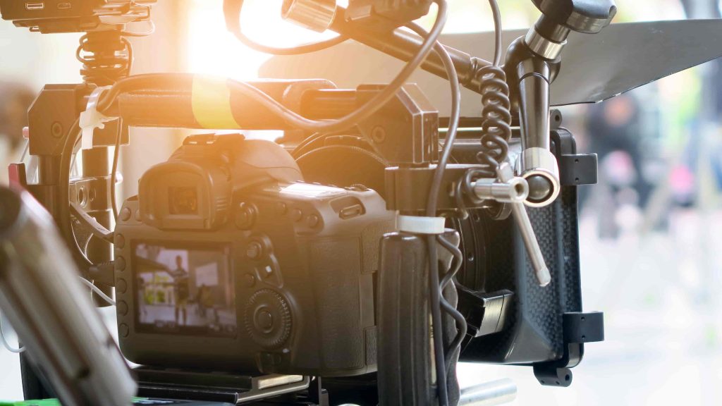 A professional film set managed by an Atlanta Video Production Company, featuring high-end lighting and cinema cameras for a corporate storytelling project.