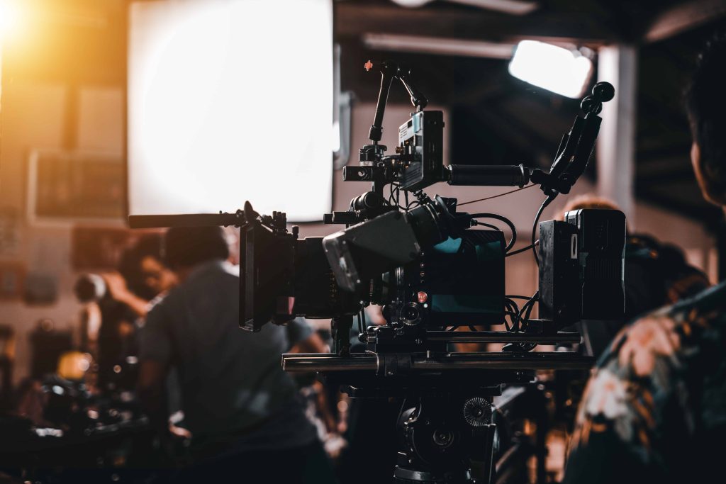 A professional team from a Houston Video Production Agency filming a high-end corporate brand story at a downtown Houston skyscraper.