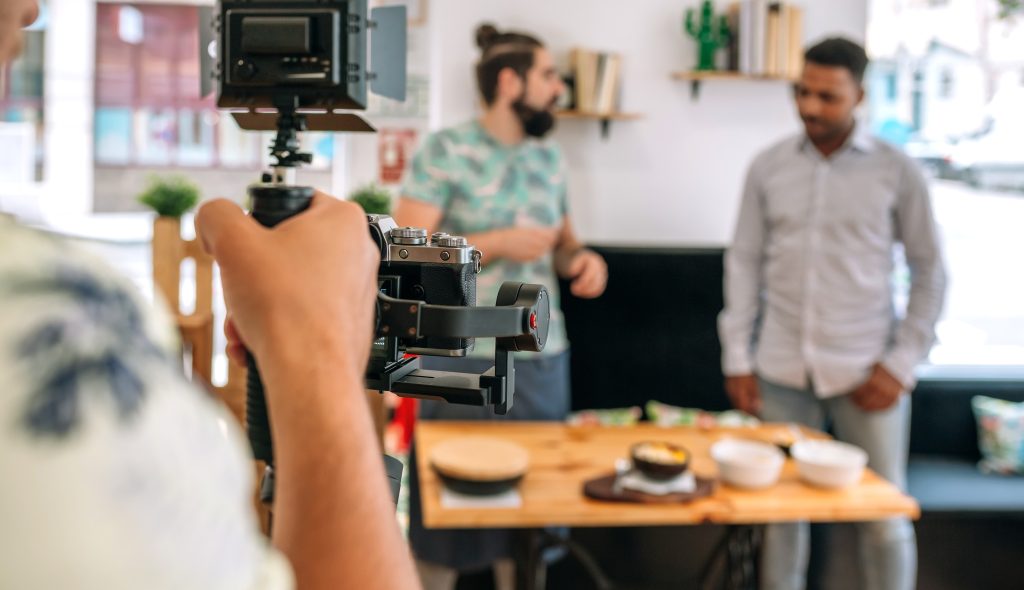 Restaurant video marketing New Orleans — Tone Production and Benjamin Tone filming an elite food brand video for a New Orleans restaurant