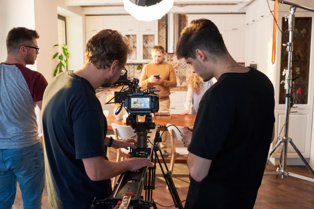 A high-end cinema camera on a motorized slider, demonstrating professional movement techniques used by a Birmingham video production company.