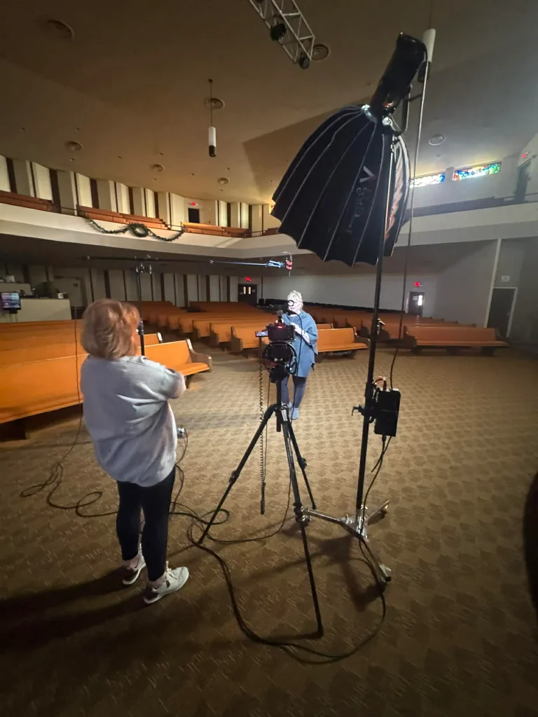 Houston Video Production Company filming a high-prestige corporate interview in a Houston skyscraper using a Sony FX3 rigged for 8K RAW.