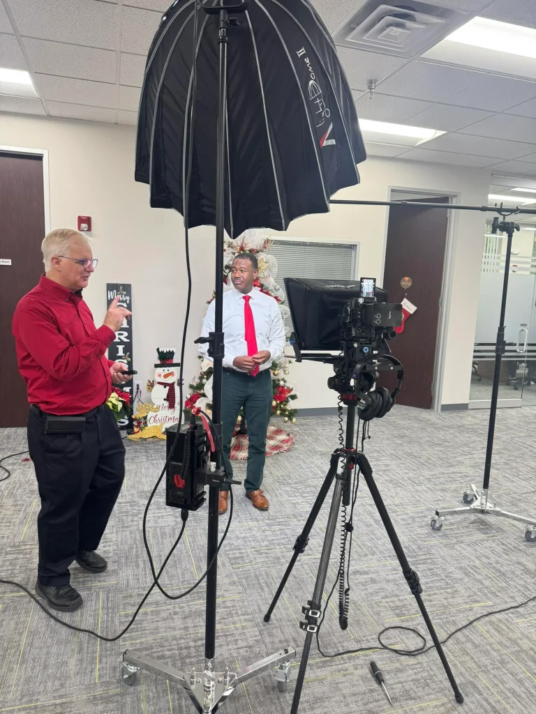Houston Video Production Company filming a high-prestige corporate interview in a Houston skyscraper using a Sony FX3 rigged for 8K RAW.