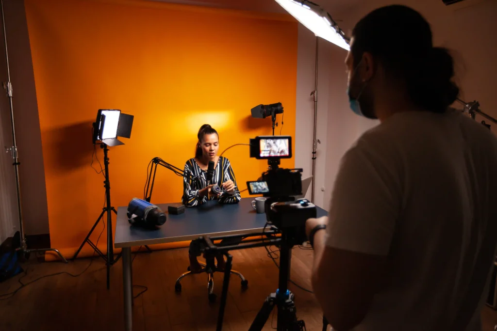A premium Charleston Video Production Company production crew from Tone Production using cinematic cameras to film a corporate brand story along the historic Charleston waterfront.