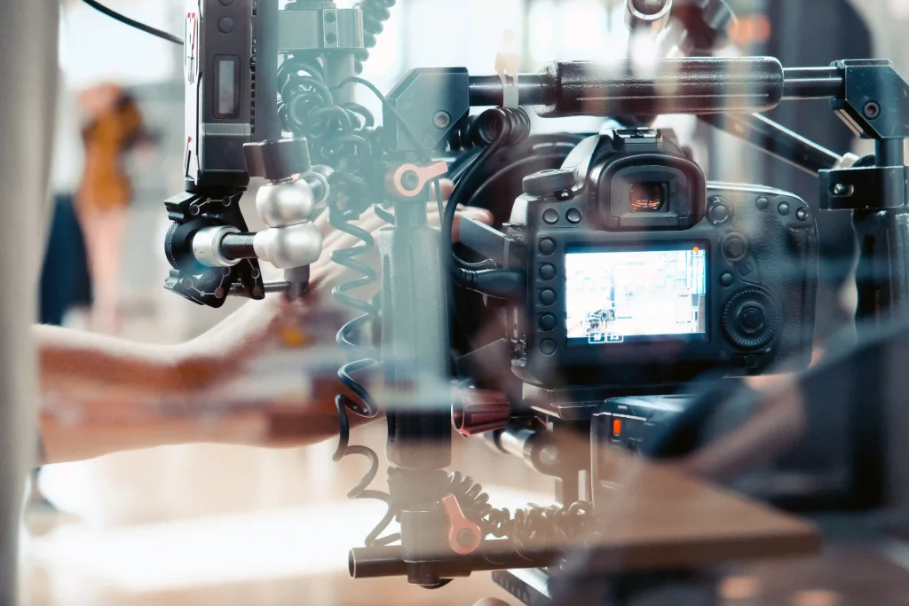 A premium Charleston Video Production Company production crew from Tone Production using cinematic cameras to film a corporate brand story along the historic Charleston waterfront.