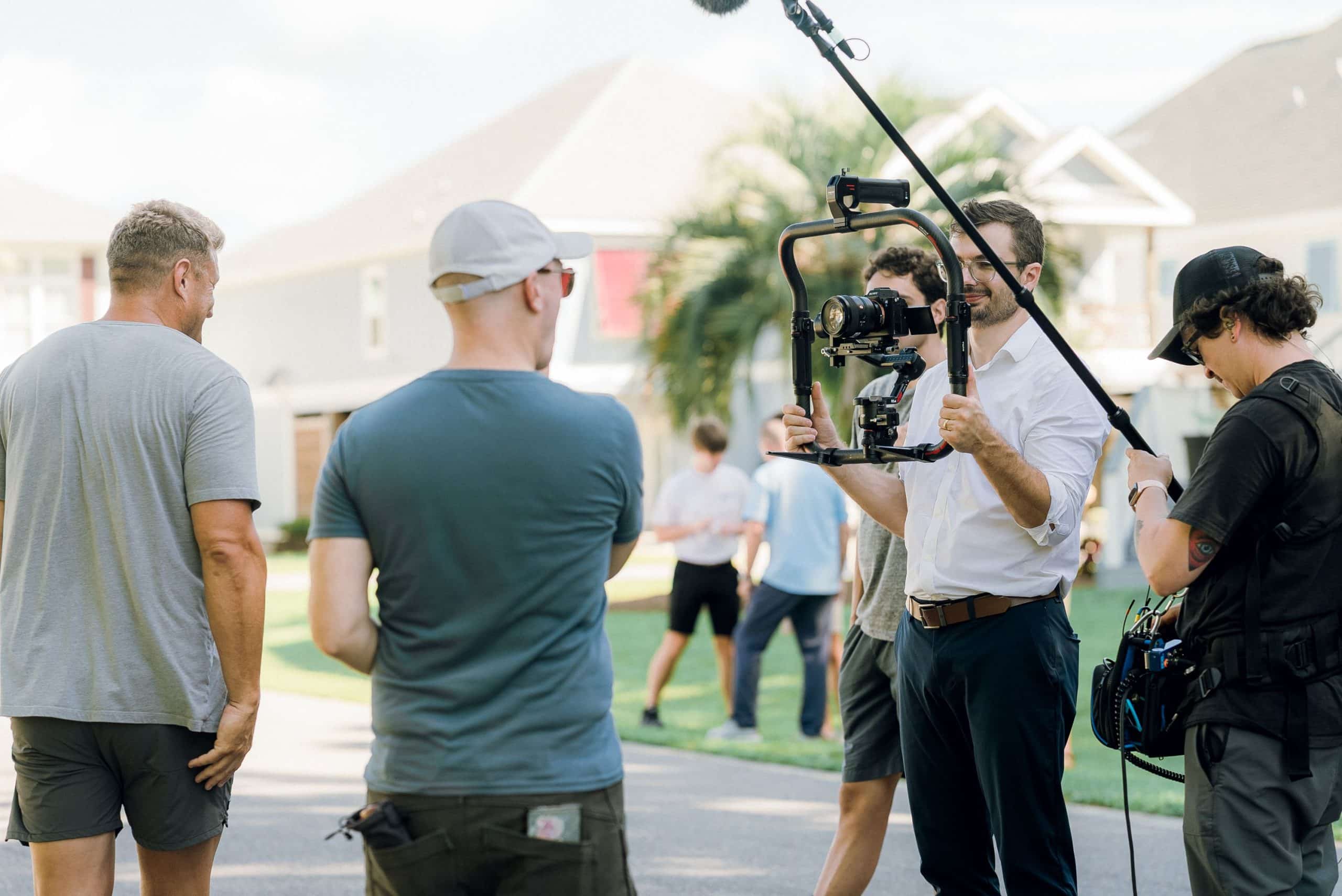 Tone Production videographers on set with a gimbal-stabilized cinema camera rig