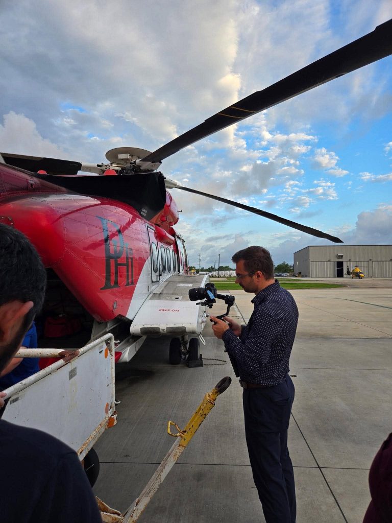 Atlanta video production company crew filming a brand video with Georgia's cinematic film infrastructure in the background