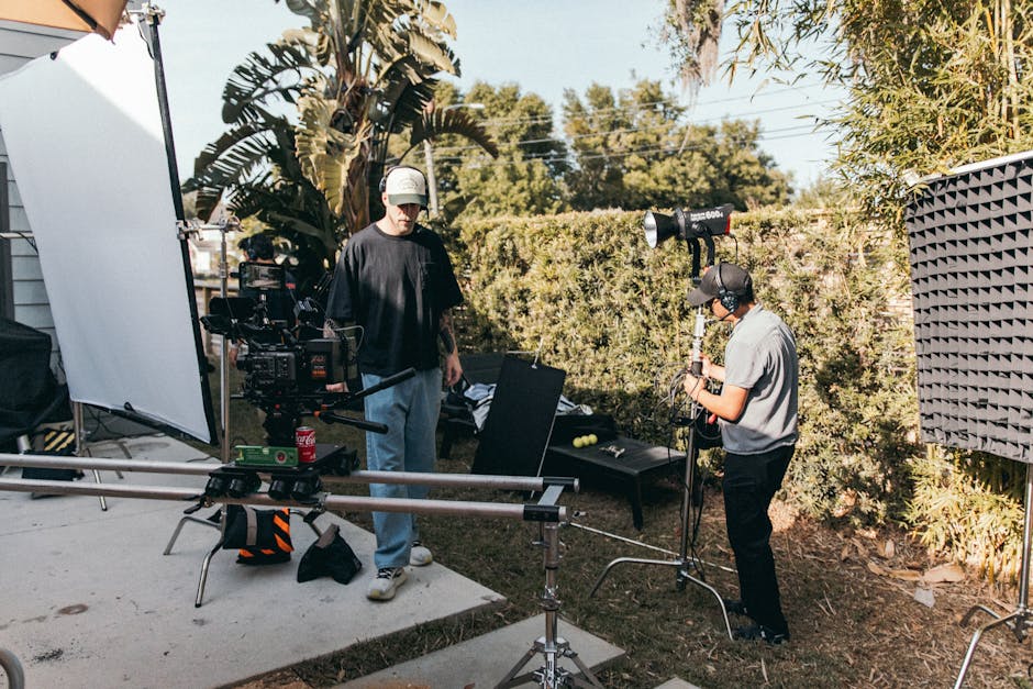 Houston videographers from Tone Production setting up an 8K cinema camera on location in downtown Houston