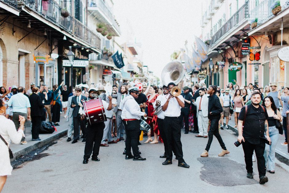 New Orleans videographers filming during festival season on Bourbon Street