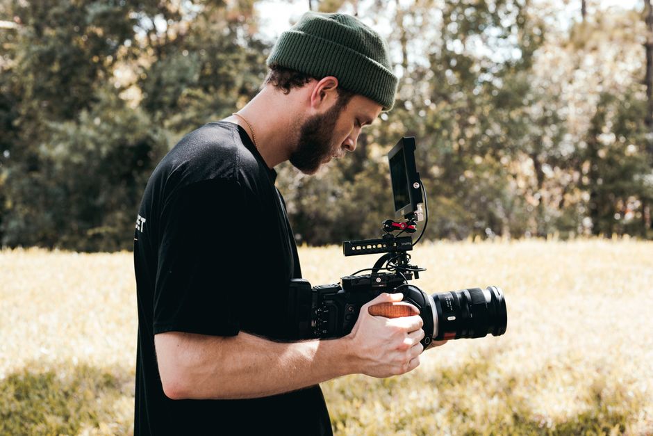 Videographer capturing b-roll ideas on a professional video production shoot