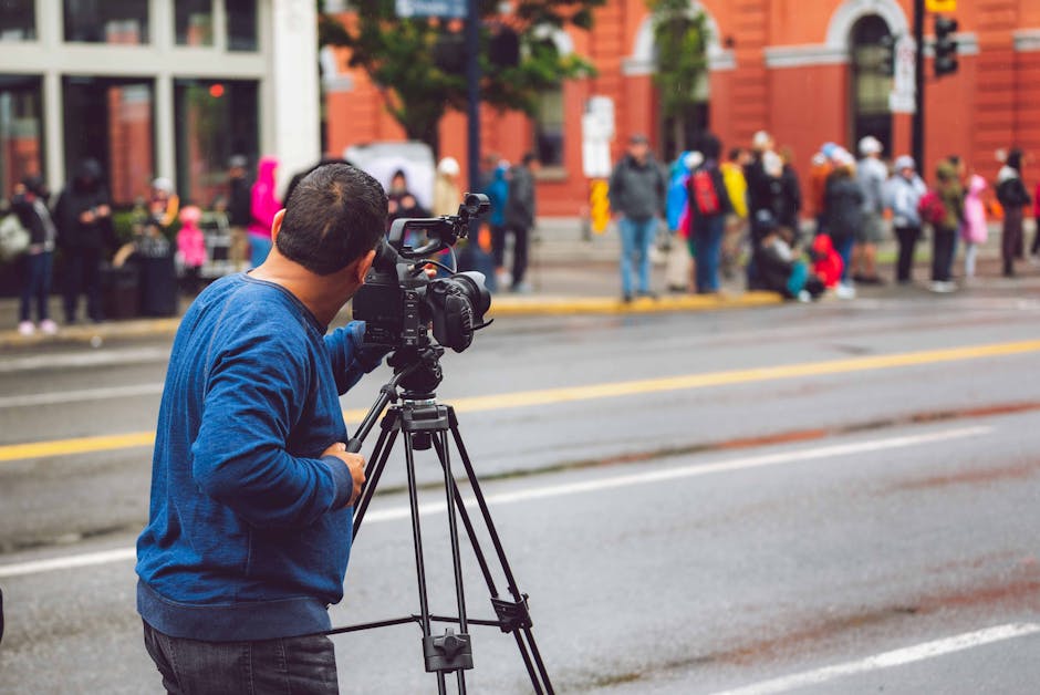 New Orleans videographers - videographer filming Mardi Gras parade