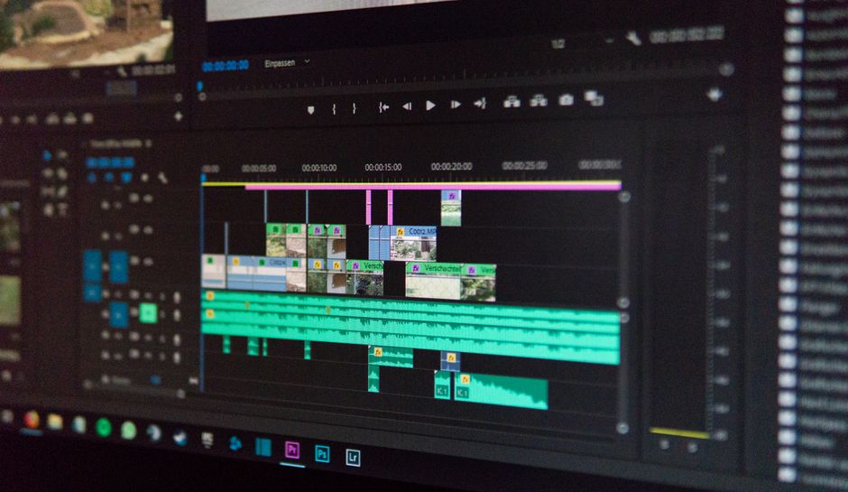 New Orleans video production company editor using AI-enhanced post-production workflow in 2026 edit bay