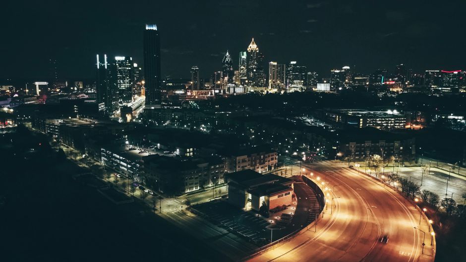 Atlanta video production company Tone Production filming cinematic 8K brand video with FAA-certified drone over Atlanta skyline