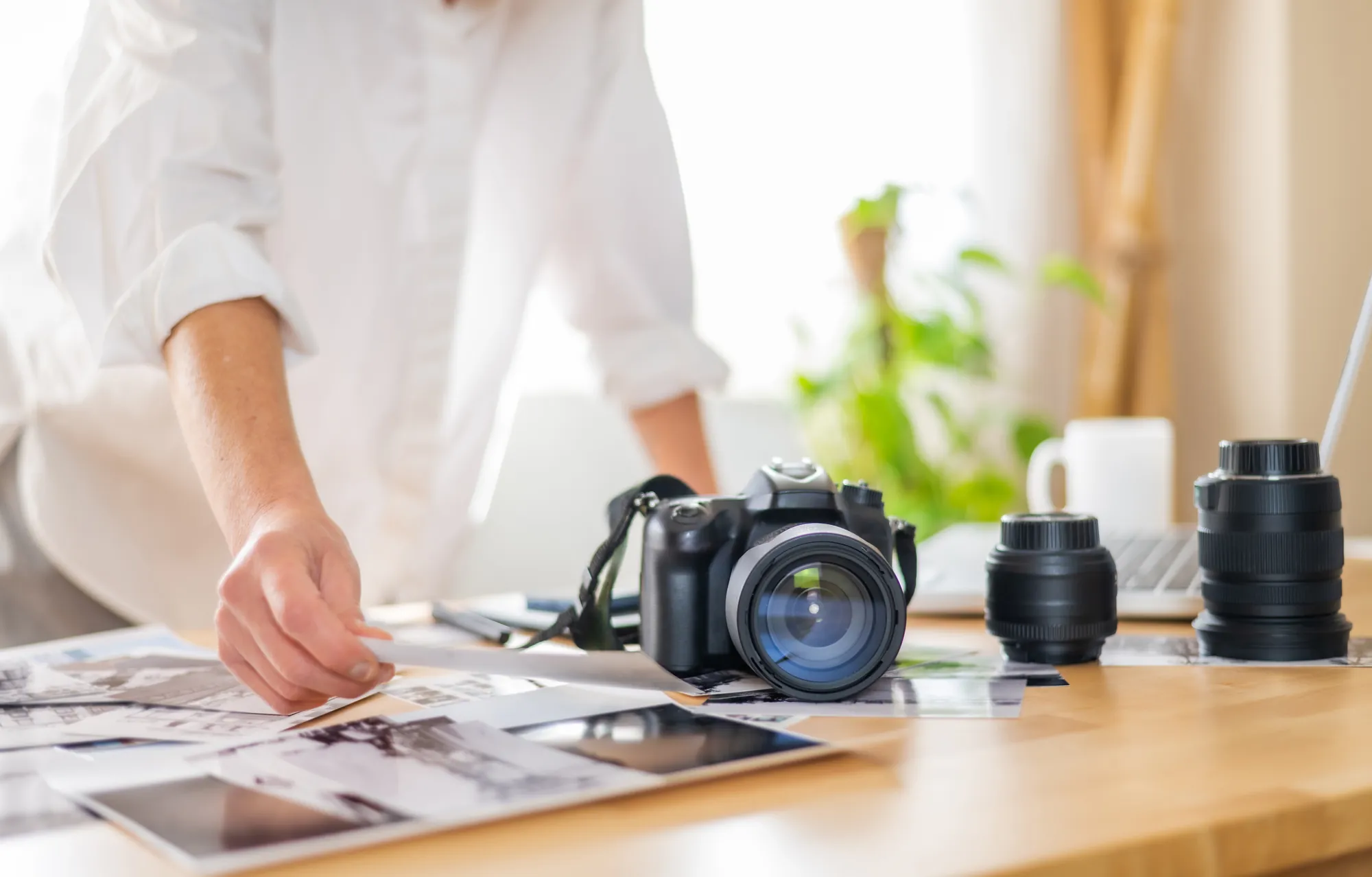 Cinematographer reviewing camera settings cheat sheet for video on a professional production set