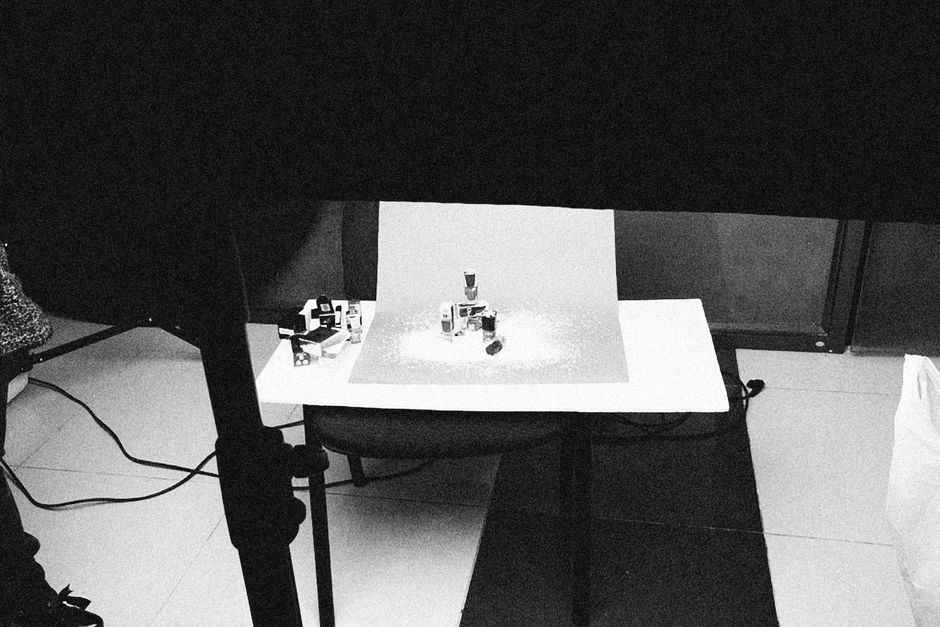 Houston photographers setting up a professional product photography shoot for e-commerce brands