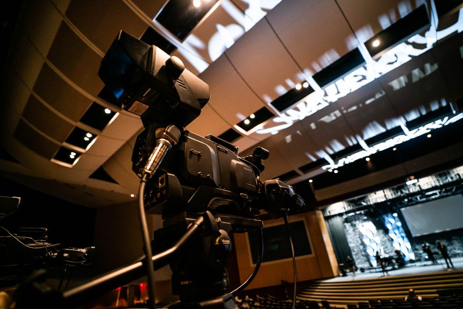 Jacksonville videographers filming a corporate trade show booth at the Prime F. Osborn III Convention Center