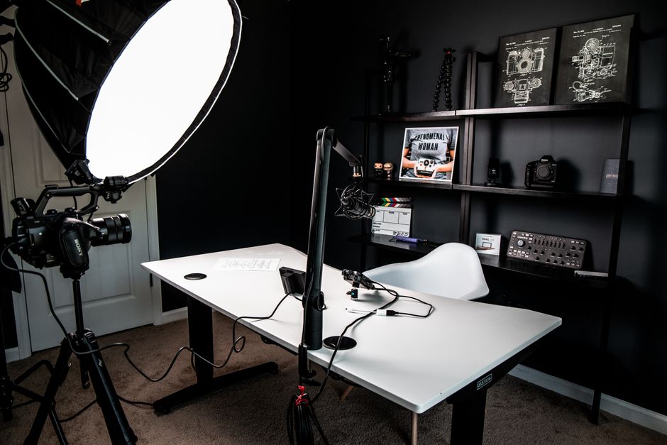 In-office product video setup showing how to film a product video on a budget with a camera, softbox light, and clean backdrop