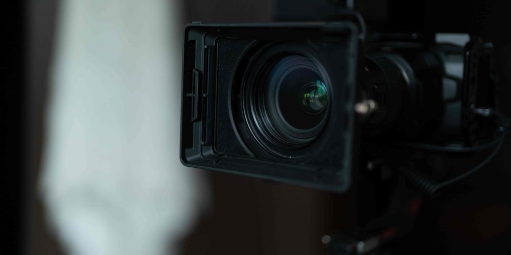 A high-velocity Chicago video production company suite featuring Benjamin Tone utilizing AI-enhanced post-production systems and 8K RAW footage.