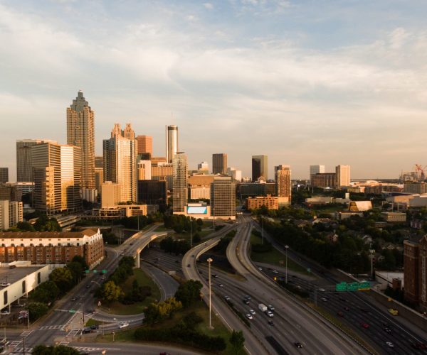 A professional Atlanta Video Production Company film crew from Tone Production capturing high-end corporate content in Midtown Atlanta.