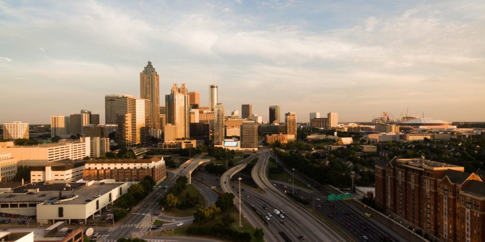 A professional Atlanta Video Production Company film crew from Tone Production capturing high-end corporate content in Midtown Atlanta.