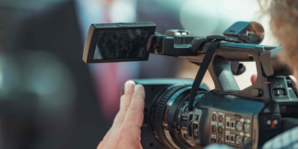 A professional Atlanta Video Production Company team from Tone Production filming a cinematic corporate brand story with expert videographers in Atlanta.