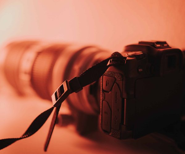A professional Charleston Video Production Company film crew from Tone Production capturing a cinematic brand story near the iconic Ravenel Bridge.