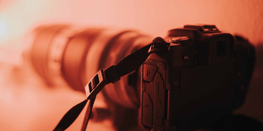 A professional Charleston Video Production Company film crew from Tone Production capturing a cinematic brand story near the iconic Ravenel Bridge.
