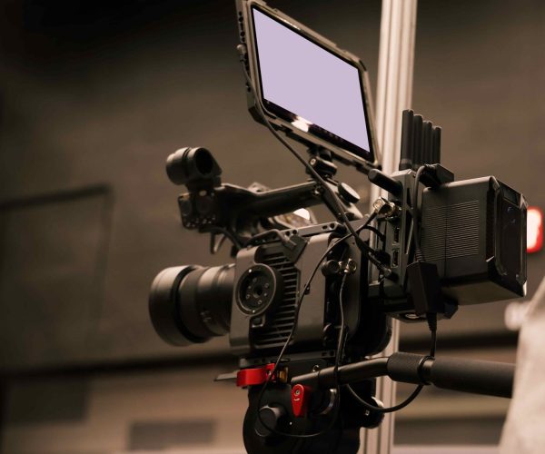 A professional Houston video production agency team from Tone Production filming a high-energy startup pitch and brand story.