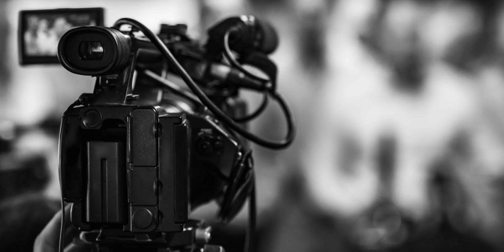 A professional Lafayette Video Production Company crew from Tone Production filming a high-impact corporate documentary at a local innovation hub