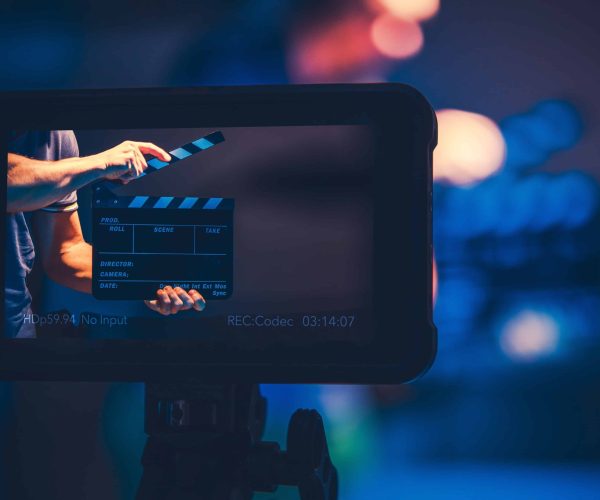 A professional New Orleans video production company crew filming a cinematic brand story on location in the French Quarter.