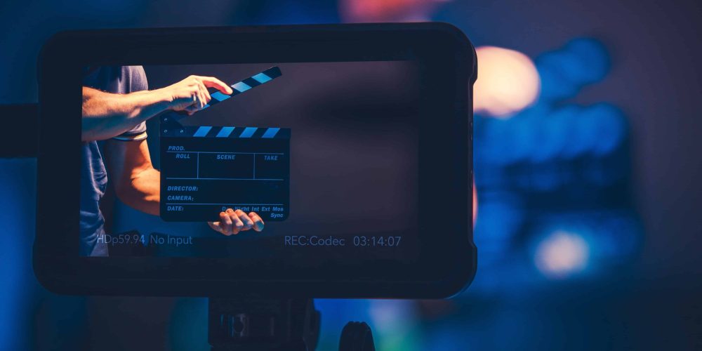 A professional New Orleans video production company crew filming a cinematic brand story on location in the French Quarter.