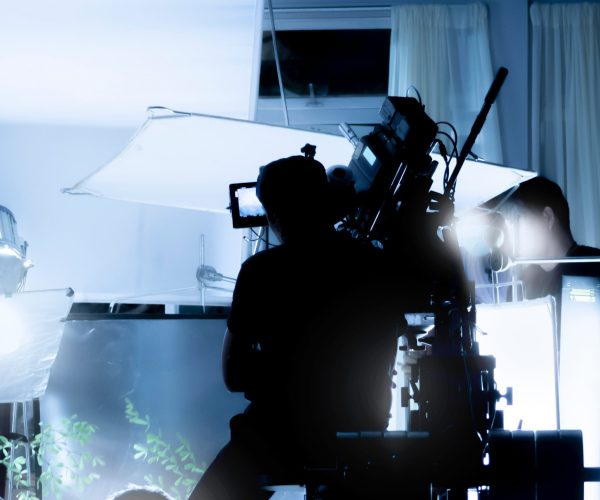 A professional New Orleans video production company team from Tone Production filming a high-impact brand story on location.