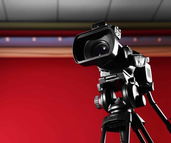 A professional Orlando Video Production Company film crew from Tone Production using high-end gear to film a brand story in a modern Orlando office space.