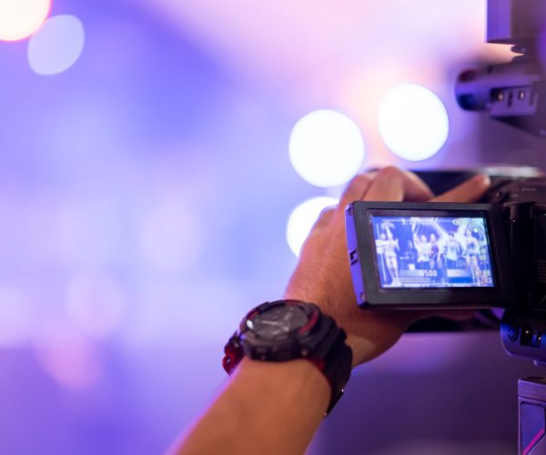 A professional cinematography crew capturing high-end footage for a Memphis video production project near the Mississippi River.