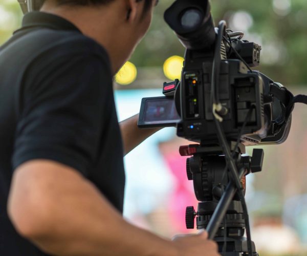 A professional cinematography team from Tone Production, a leading Shreveport Louisiana Video Production Company, filming a brand story in downtown Shreveport.