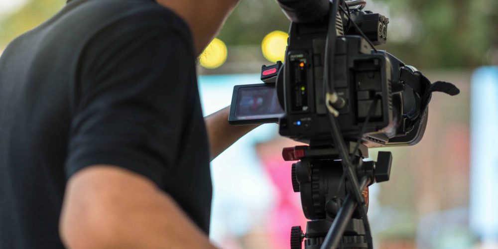 A professional cinematography team from Tone Production, a leading Shreveport Louisiana Video Production Company, filming a brand story in downtown Shreveport.