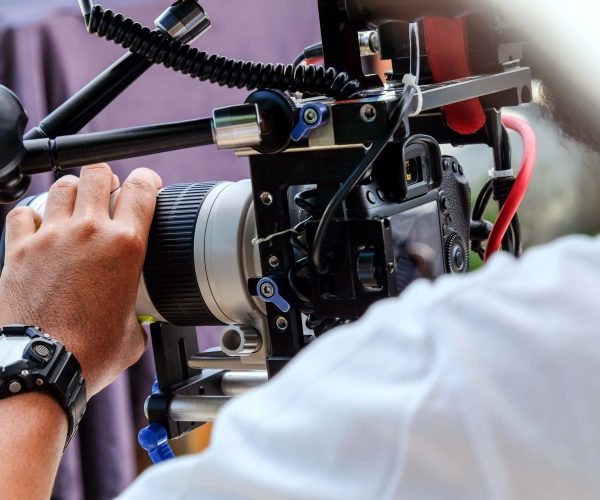 A professional team from Tone Production, a premier Jackson video production company, filming a high-impact corporate brand story in downtown Jackson.