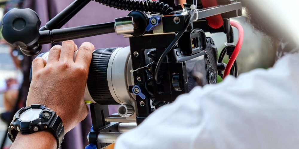 A professional team from Tone Production, a premier Jackson video production company, filming a high-impact corporate brand story in downtown Jackson.