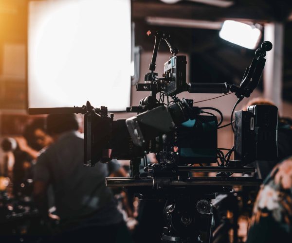 A professional team from a Houston Video Production Agency filming a high-end corporate brand story at a downtown Houston skyscraper.