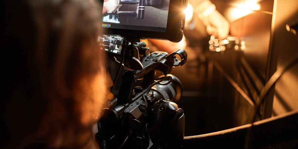 Elite New Orleans Video Production Company filming a high-end culinary experience at a luxury French Quarter restaurant by Tone Production.