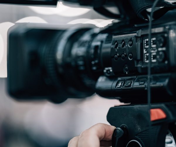 Camera at a Live Media Conference.