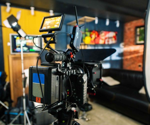 Elite Orlando Video Production Company film crew capturing a high-stakes corporate event by Tone Production and Benjamin Tone.