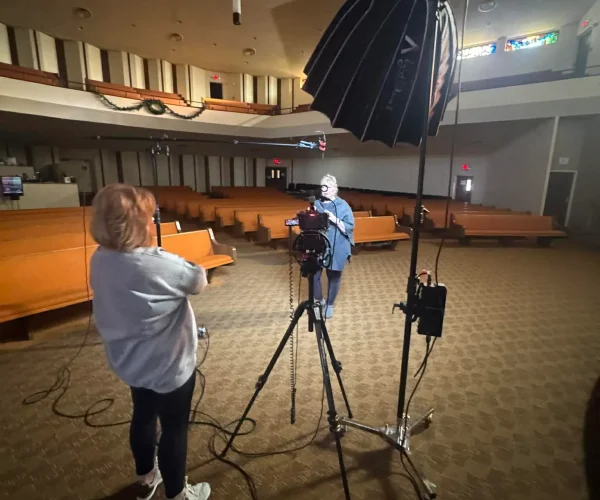 Houston Video Production Company filming a high-prestige corporate interview in a Houston skyscraper using a Sony FX3 rigged for 8K RAW.