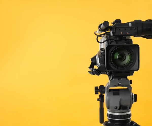 Mobile AL video production company team testing cameras for professional video production