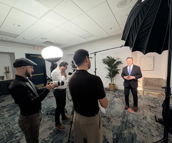An elite Pensacola video production company crew led by Benjamin Tone capturing cinematic Gulf Coast tourism assets in 8K RAW.