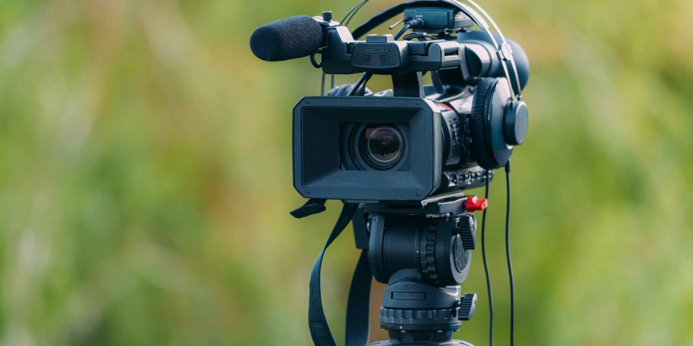 Professional Mobile, AL video production company Tone Production capturing a cinematic sunrise over Mobile Bay for a corporate brand story.