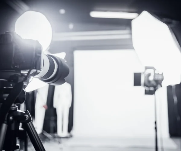 Scottsdale video production company comparing photography and videography setups for Arizona luxury business brand shoot in desert landscape