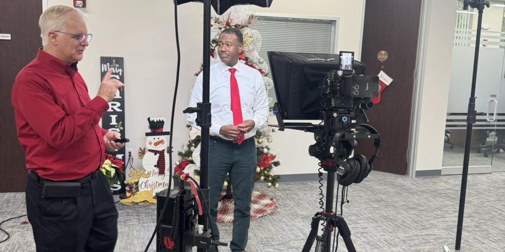 Jacksonville videographers capturing clean location sound on a corporate on-site shoot